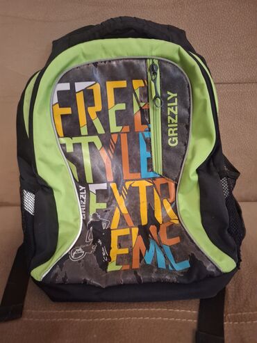Беговые дорожки: Fristyle Extreme yazısı ilə bəzədilmiş qara və yaşıl rəngli Grizzly