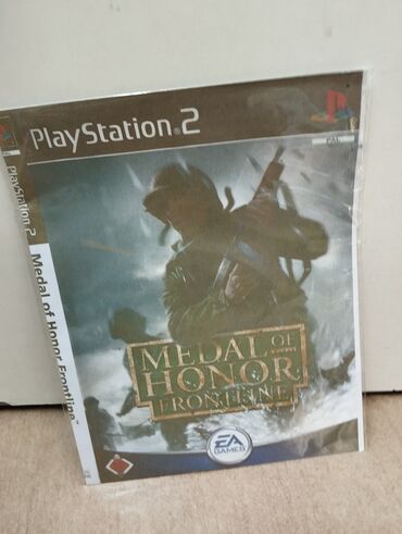 Oyun diskləri: PlayStation 2 üçün God of War oyunu. Rus və İngilis dillərində — 4