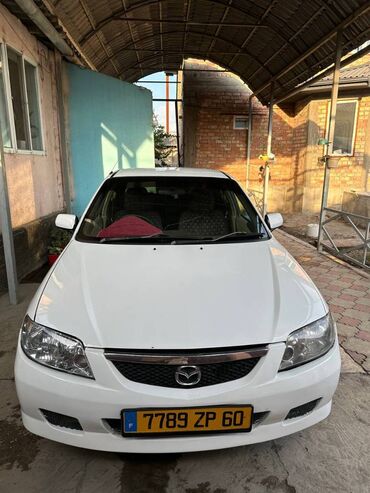 деловые автомобили: Mazda Familia: 2003 г., 1.5 л, Автомат, Бензин, Седан