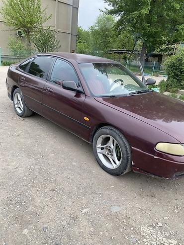 e6 3: Mazda 626: 1992 г., 2 л, Механика, Бензин, Седан — 5