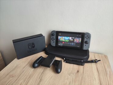 Nintendo Switch: Прошитый Нинтендо свитч, хорошее состояние, куча игр, чехол + весь