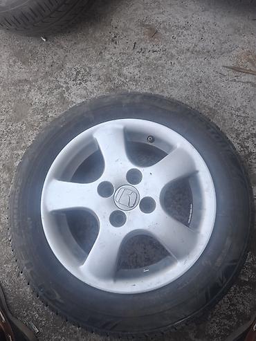 Легкосплавный диск Honda с шиной Bridgestone - Диаметр диска: R14 -