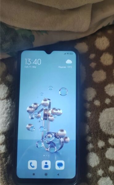 kaput na rukavprirodno krzno: Xiaomi Redmi 9C, 32 GB, color - Blue, Fingerprint, Dual SIM cards, Face ID