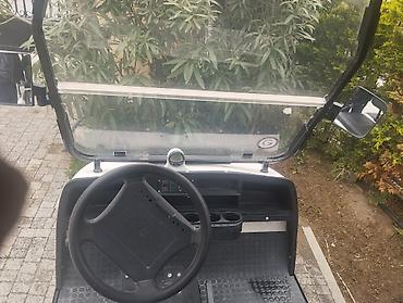 Microcar: Elektrik qolf karı – 2+2 yerlik, ağ rəng Xüsusiyyətlər: - Elektrik — 4