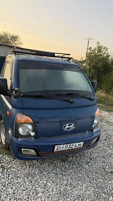 Унаа: Hyundai Porter — компактный бортовой грузовик синего цвета с — 2