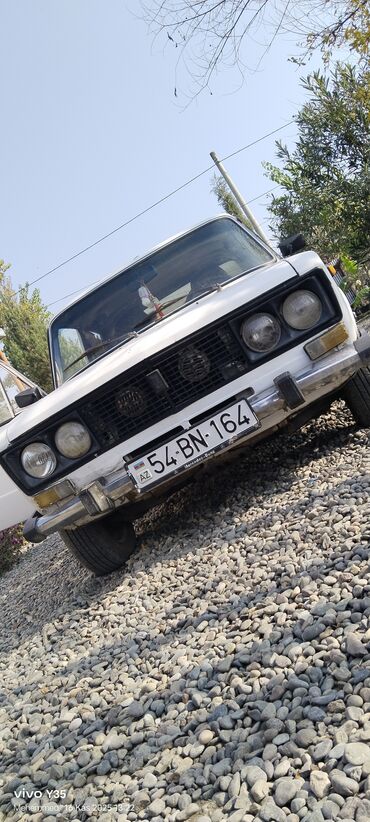 VAZ (LADA): VAZ 2106 (klassik “Jiguli”) – ağ rəngli sedan Xarici: - Dördgöz ön — 16