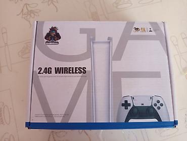 iphon 16 pro: 2.4G Wireless Game Stick Pro – TV üçün oyun konsolu seti — 1