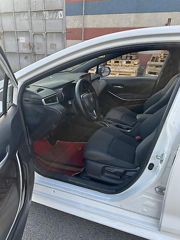 купить витц: Toyota Corolla: 2022 г., 1.8 л, Вариатор, Гибрид, Седан — 10