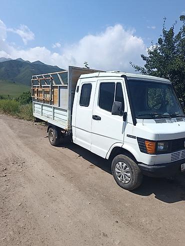света диоты: Mercedes-Benz T2 (207/208/210) бортовой грузовик с двойной кабиной. - — 1