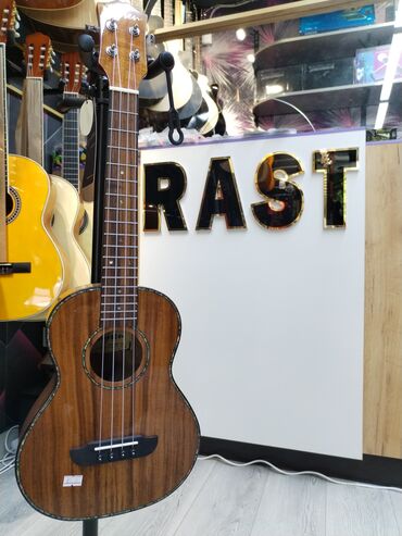 elektro gitara: Ukulele, Yeni, Ünvandan götürmə