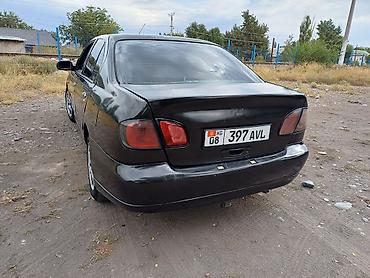su 7: Nissan Primera: 2001 г., 1.8 л, Механика, Бензин, Седан — 4