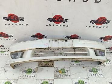 Передний бампер для автомобиля с интегрированными противотуманными