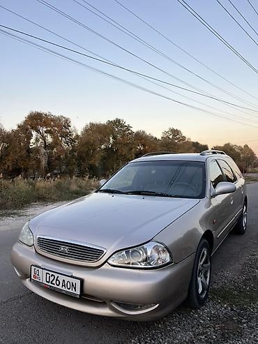 айнек рамка: Kia Clarus: 2000 г., 2 л, Автомат, Бензин, Универсал — 1