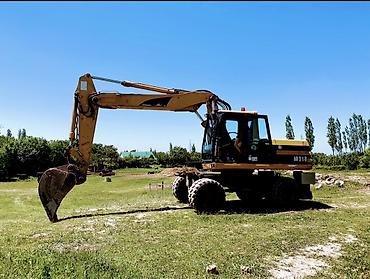 экскаватор на продаже: Экскаватор, Caterpillar, Колесный — 1