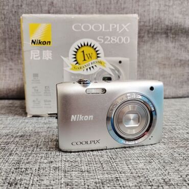 adapterler: Nikon fotoaparat yaddas kartı adapter ve batareyası var. qutusu ilə