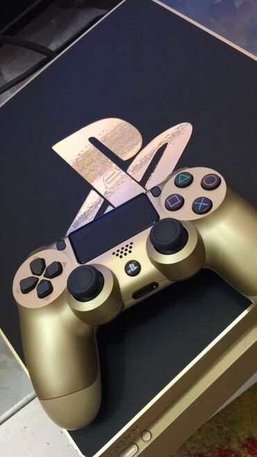 Sony PlayStation: PlayStation 4 с геймпадом DualShock 4 - Модель: PS4 Slim (компактный