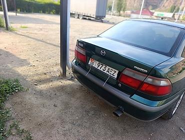 385 55: Mazda 626: 1999 г., 1.8 л, Механика, Бензин, Седан — 4