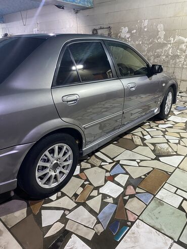 авто инвертор: Mazda Familia: 2002 г., 2 л, Автомат, Бензин, Хэтчбэк