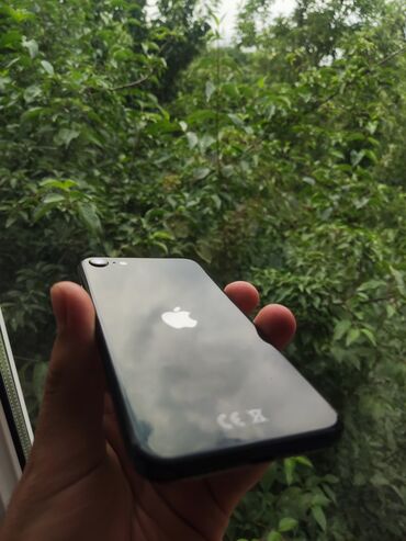 телефон fly v100: IPhone SE 2020, 64 ГБ, Черный, Отпечаток пальца, Беспроводная зарядка