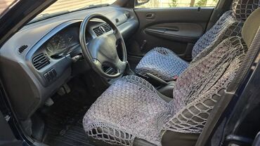 Mazda: Mazda 323: 1996 г., 1.6 л, Механика, Бензин, Седан