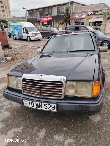 Mercedes-Benz: Mercedes-Benz W124: 2.3 l | 1989 il Sedan