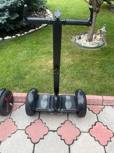 зарядка для гироскутер: Гироскутер by Segway черного цвета с регулируемой рулевой колонкой и