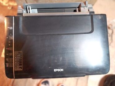 Принтеры: МФУ Epson Stylus TX117 (принтер/сканер/копир)Canon
на запчасти — 12