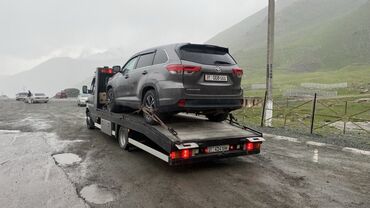 бак бутагыч: Көтөргүсү менен, Гидроманипулятору менен, Кыймылдуу платформасы менен