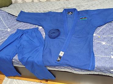 İdman formaları: Məhsul: Adidas mavi cüdo kimono dəsti Tərkib: - Jaket (yuxarı hissə) — 2