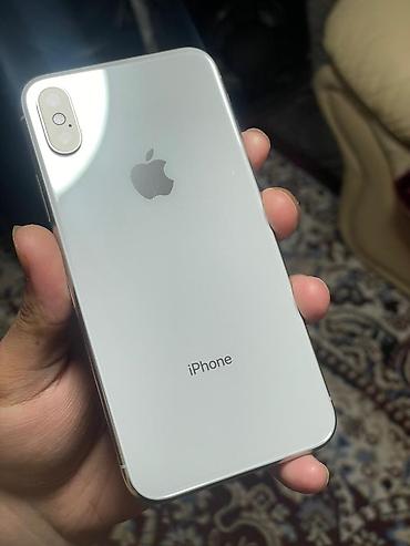 Apple iPhone: IPhone X, Б/у, 64 ГБ, Серебристый, Чехол, 73 % — 1