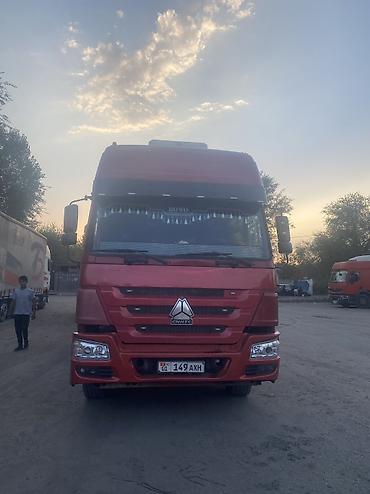 camry se: Тягач, Howo — 1