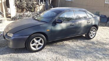 кожаные чехлы для авто: Mazda 323: 1995 г., Механика, Бензин, Купе