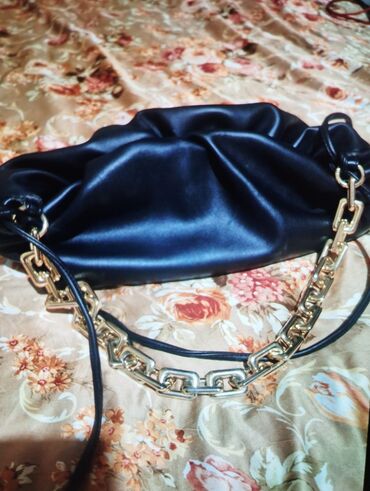 tek qas: Çiyin çantası