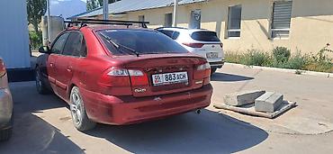помпа на мазду: Mazda 626: 1999 г., 2 л, Механика, Бензин, Седан — 9