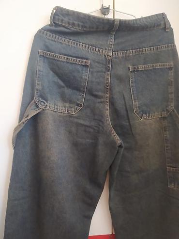 Kişi geyimləri: Unisex geniş kəsimli cins şalvar 40₼ alınıb 20₼ satılır 30 razmer!!! — 2