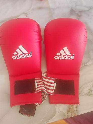 elcek satisi: Məhsul: Adidas karate/taekvondo əlcəkləri (qırmızı) Xüsusiyyətlər: - — 2