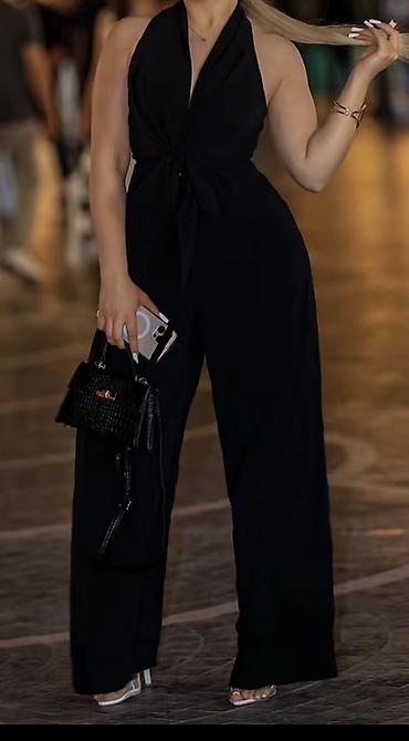 kombinezon: Qara rəngli qadın kombinezonu - Model: halter yaxalı, sinədə — 1