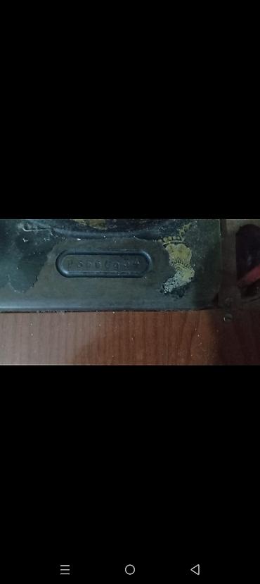 dikis masini: Qədimi paltar tikən maşindi Məhsul: Ayaq pedallı tikiş maşını – — 3