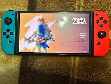 nintendo da: Nintendo Switch (OLED model) oyun konsolu – neon qırmızı və neon mavi — 6