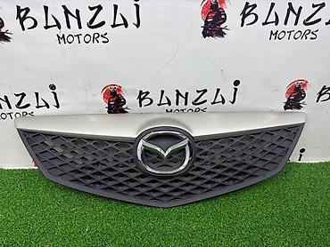 ноускат демио: Решетка радиатора Mazda 2004 г., Б/у, Оригинал — 1