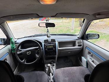 ann chery: Mazda Demio: 2001 г., 1.5 л, Механика, Бензин — 3