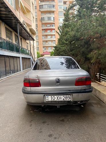opel omega: Opel Omega: 2.5 l | 1994 il Sedan — 3