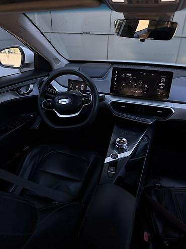 автомобили электро: Geely Geometry E: 2022 г., Автомат, Электромобиль, Седан — 4