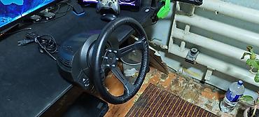 Рули: Комплект для симрейсинга Thrustmaster + аксессуары Состав: - Руль — 7