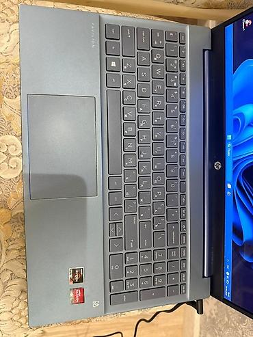 camera lens: HP Pavilion 15 — тонкий ноутбук в синем металлическом корпусе — 5