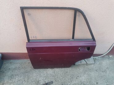 Auto delovi: Vrata zadnja leva Lada 2107 Riva,2105 u bordo boji . Vrata su — 2