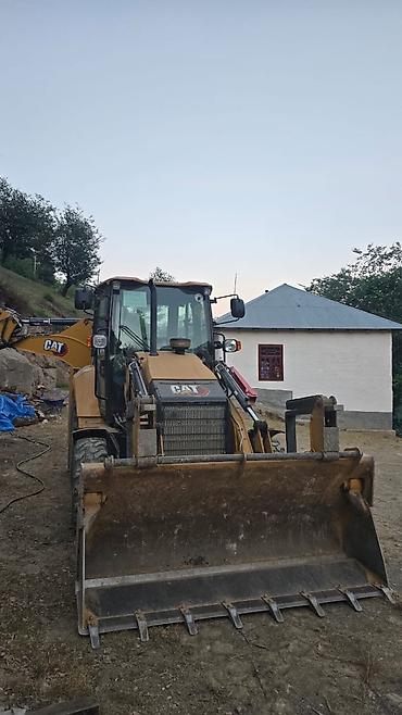 arxa panel: Caterpillar 426 ekskavator-yükləyici 2400 moto saat - Model — 2