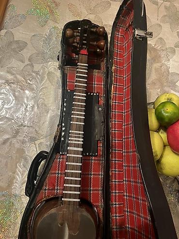 gitara satilir: Tar – milli simli musiqi aləti, sərt futlyarla Xüsusiyyətlər: - — 7