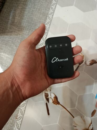 azercell mifi modem satilir: Azercell modem yeni kimidir.Cəmi 2ay istifadə olunub.Sadəcə nömrə alıb
