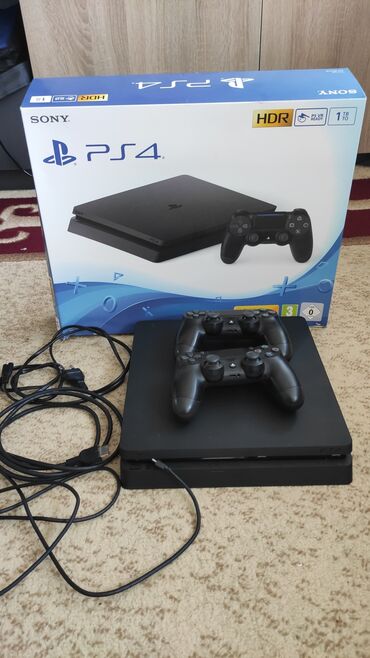 PS4 (Sony Playstation 4): PlayStation 4 slim 1Tb. Əla vəziyyətdədir təmirdə olmayıb. Üstündə 2